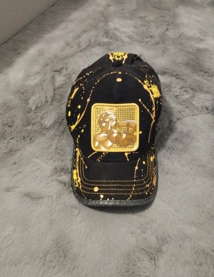 Casque noir jaune doré freezer gold - dragon ball neuve
Réglable a l'arrière