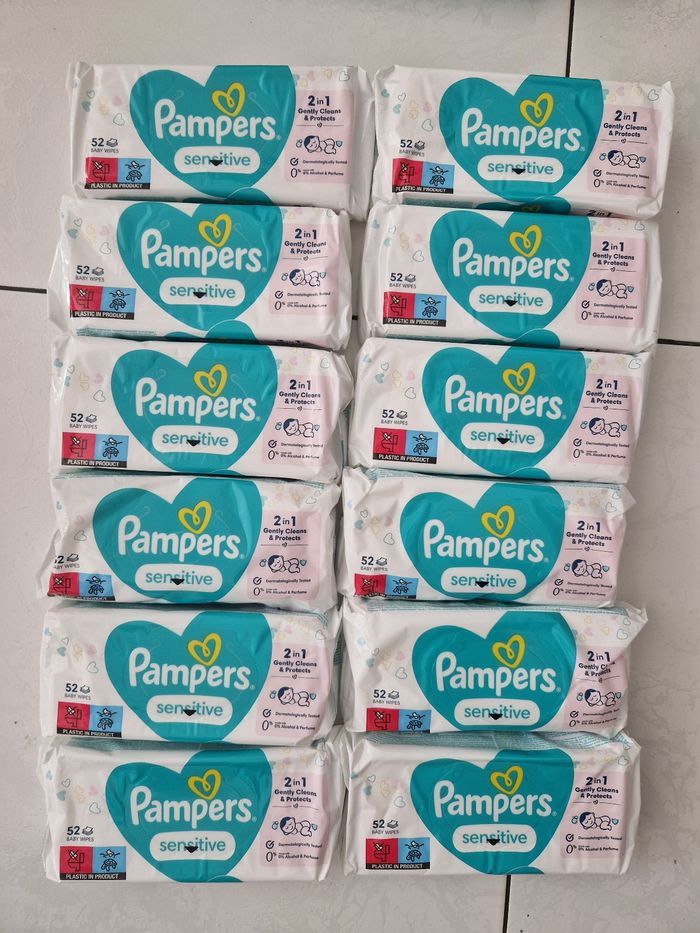 12 paquets de lingettes pampers