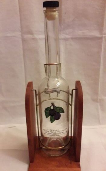 Bouteille decor prune sur balancelle