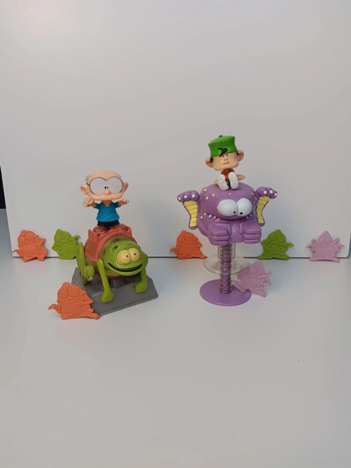 Lot figurines vintage kid paddle taille 14cm pour la plus grande