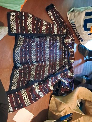 Gilet avec un large col