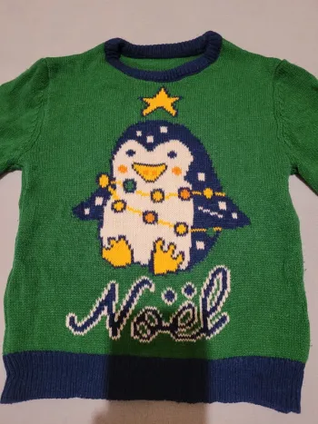 Pull Noël taille 7 ans