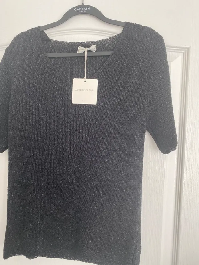 Joli pull manches courtes