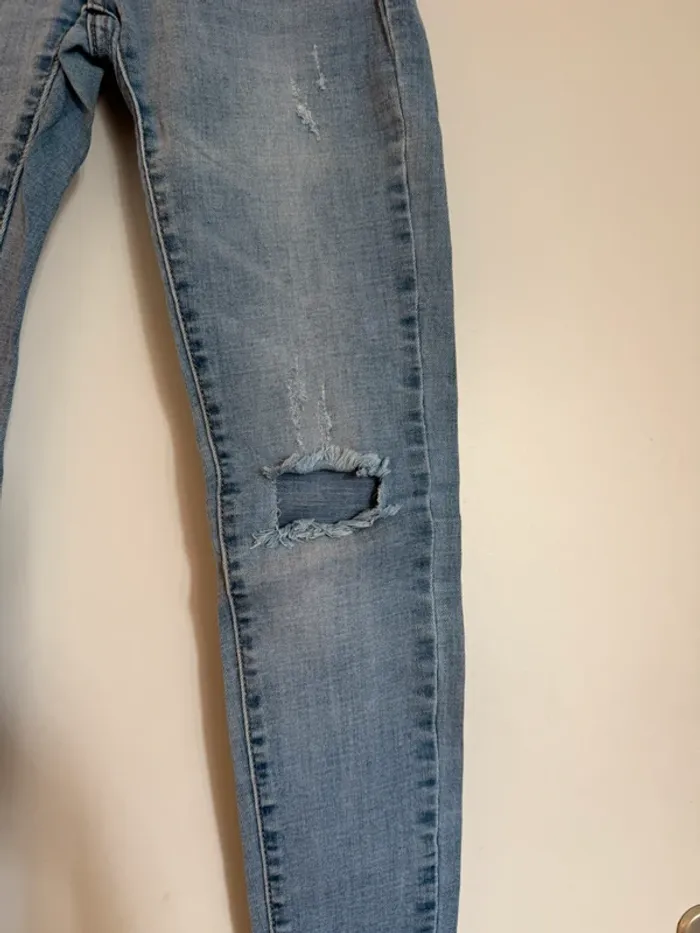 Jean slim bleu en très bon état effet déchiré taille 36 by swan - photo numéro 3