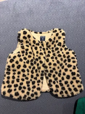 Veste sans manches moumoute