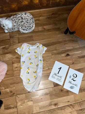 Body motifs citrons très bon état hema 74/80cm