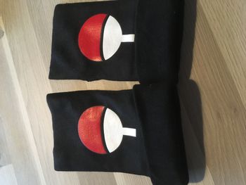 Paire de mitaines Naruto Symbole Uchiha Sasuke