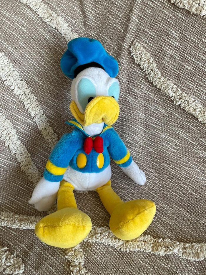 Peluche doudou 32cm Disney Donald bleu jaune et blanc très bon état - photo numéro 2