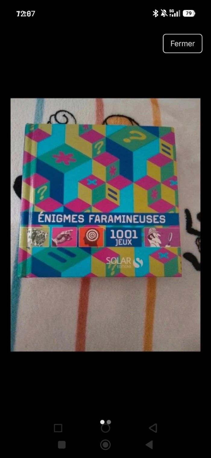 Livre a énigmes - photo numéro 1