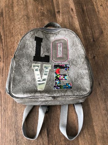 École Mooie/rugtas van Shoesme