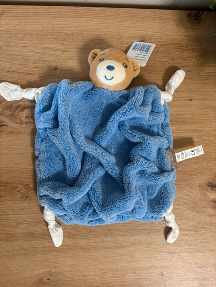 Neuf doudou plat ours plume bleu indigo kaloo