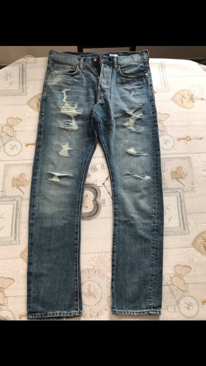 Jean homme troués neuf