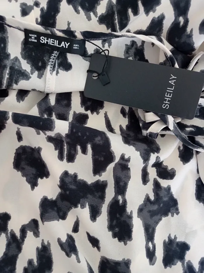 Robe trapèze d'été fines bretelles imprimé fantaisie beige et noir neuve avec étiquette T.L Sheilay - photo numéro 4
