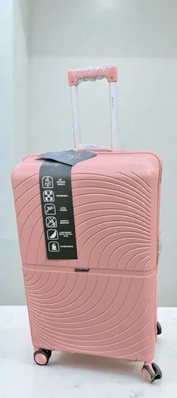 Grande valise rose pâle incassable neuve