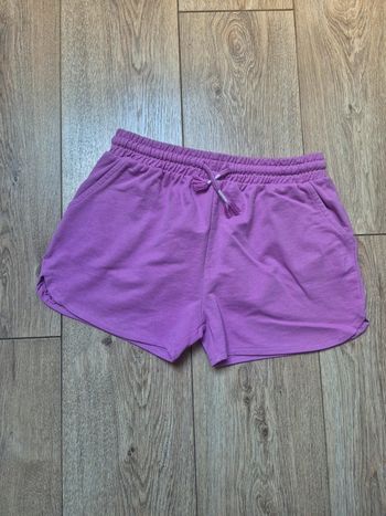 Short rose violine gémo 12 ans en très bon état