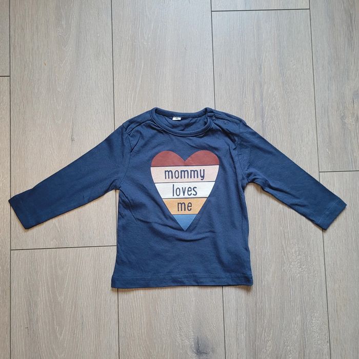 Très joli maillot bleu avec motif coeur. Fille 18 mois