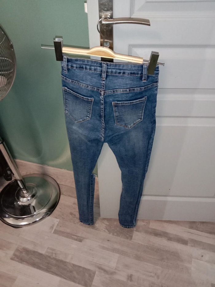 Jeans déchiré - photo numéro 3