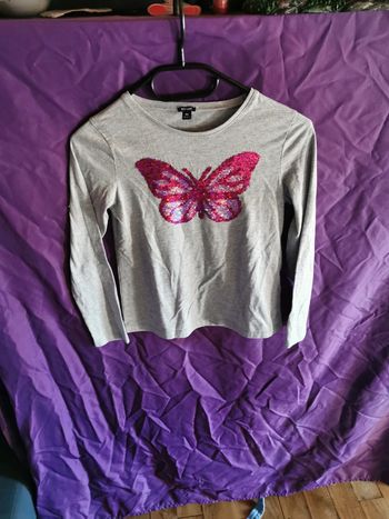 Manches longues papillon sequin