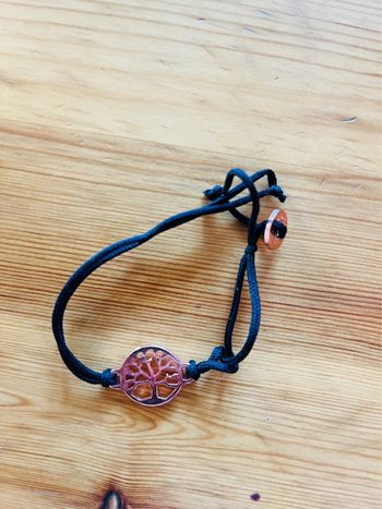 Bracelet fantaisie cordon doré rose