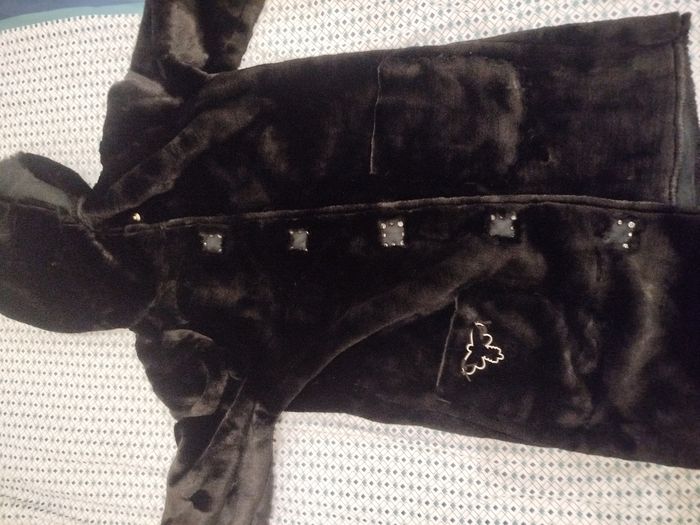 Manteau fausse fourrure