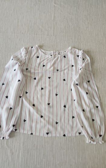 Blouse blanche à motifs en 10 ans
