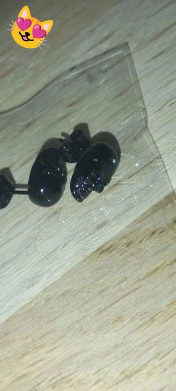 Boucle d'oreille tête de mort