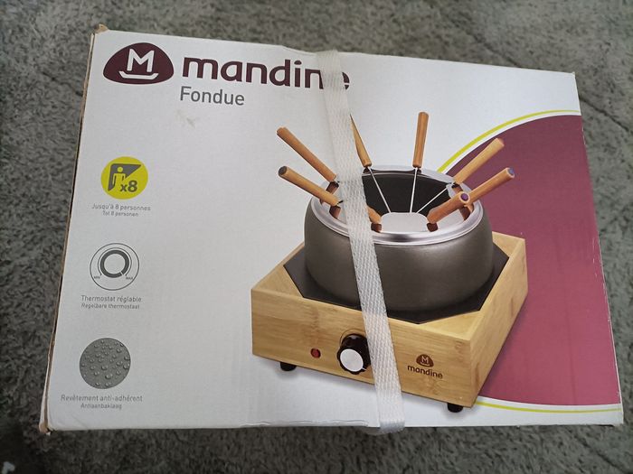 Appareil neuf a fondu mandine
