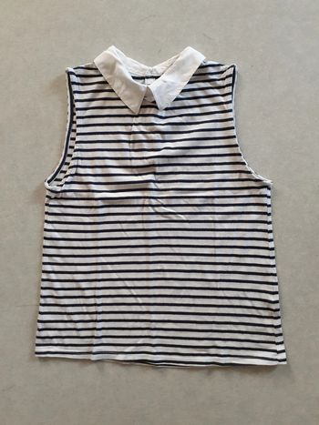 Polo rayé sans manches