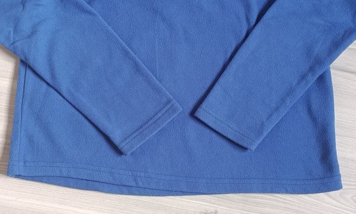 Sweat molletonné et zippé de couleur bleu clair. Taille 12 ans - photo numéro 8