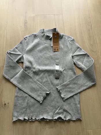 Sous pull col  kiabi 10 ans neuf avec étiquette 
