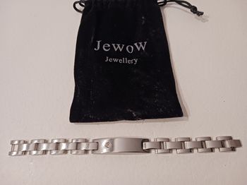 Gourmette argentée mixte avec sa pochette noire