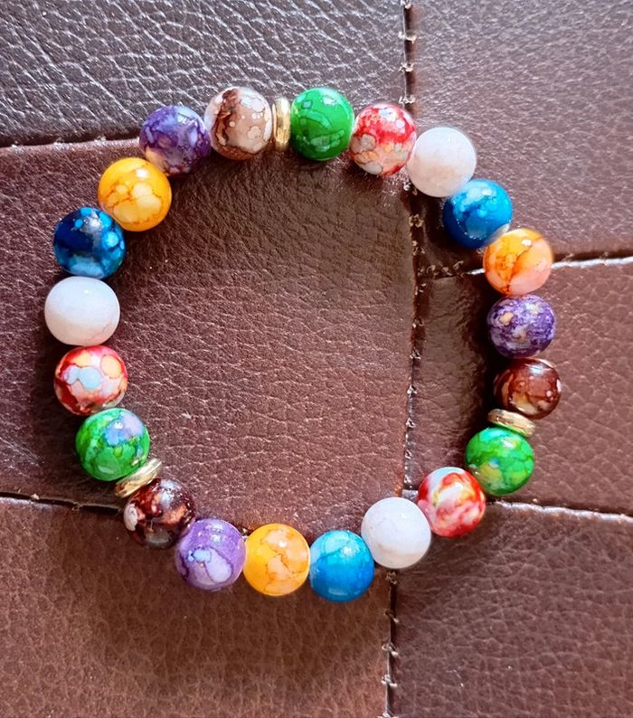 Bracelet élastique avec les 7 chakras neuf