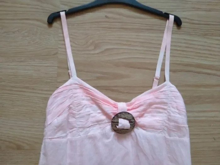 Robe courte a bretelles. Femme. Rose.
Taille 36 - photo numéro 6