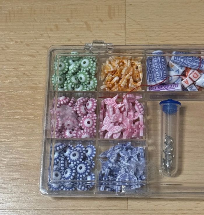 Set de perles roses papillons - photo numéro 2