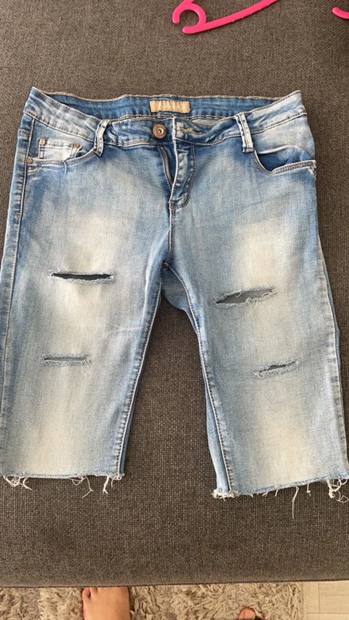 Short long en jean troué