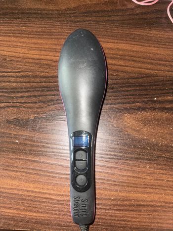 Brosse chauffante et lissante