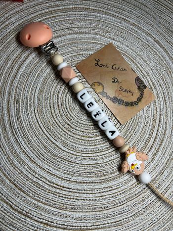 Attache tétine oiseaux