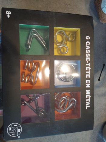 6 cassé tête en métal