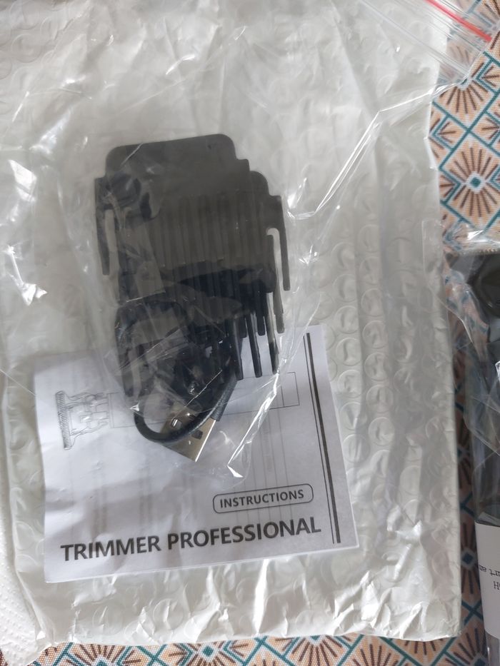 Tondeuse à cheveux noir motif bouhda - photo numéro 2