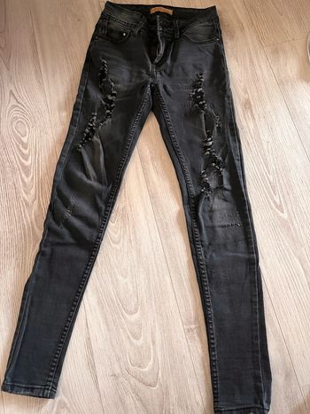 Jeans slim troué