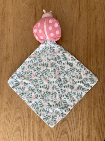 doudou coccinelle imprimé feuillage