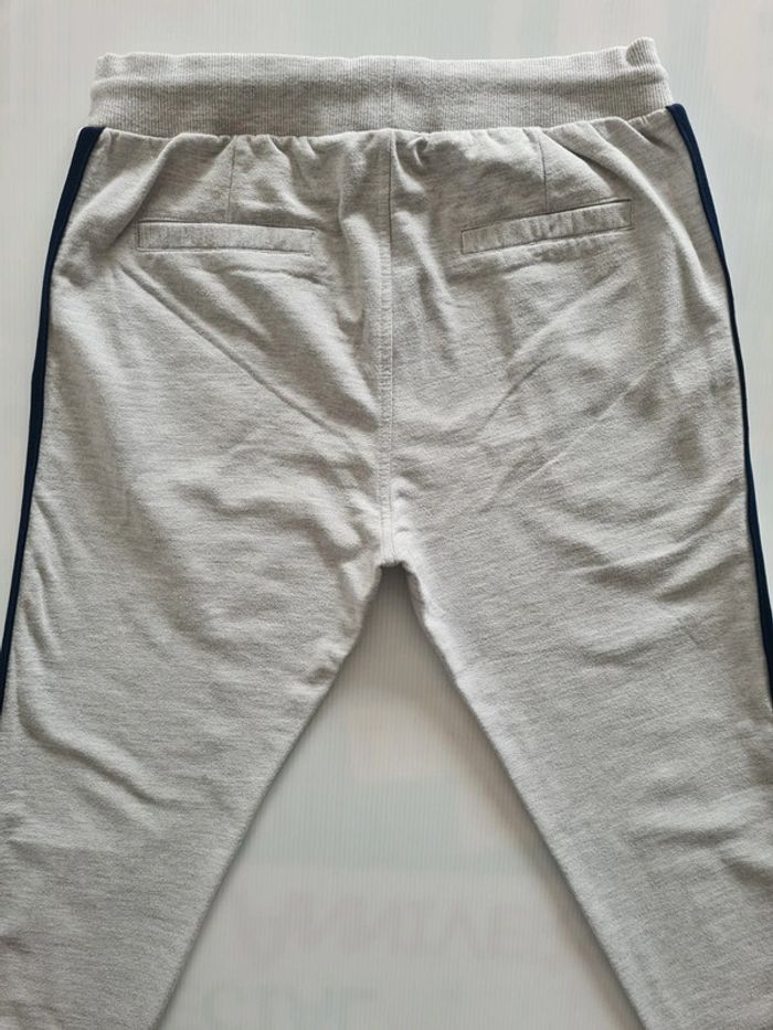 Pantalon jogging fille gris avec bandes marine et blanc sur les côtés taille 14 ans - photo numéro 8