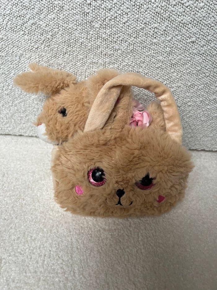Lapin dans un sac en peluche Fizzy