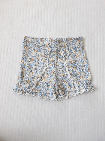Short fleurs Primark 12/18 mois