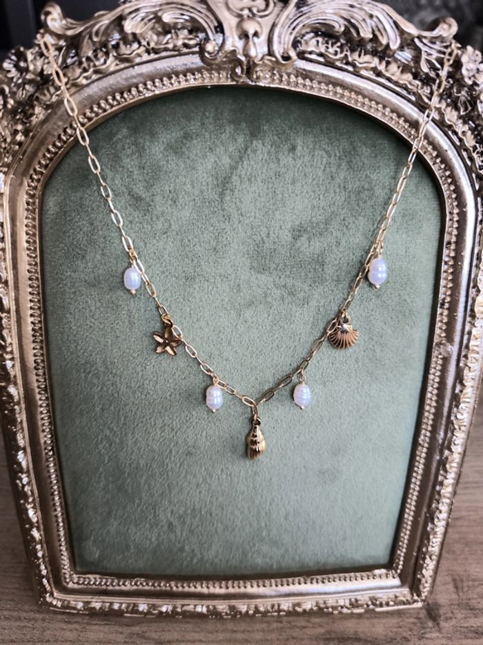 Collier breloques coquillage