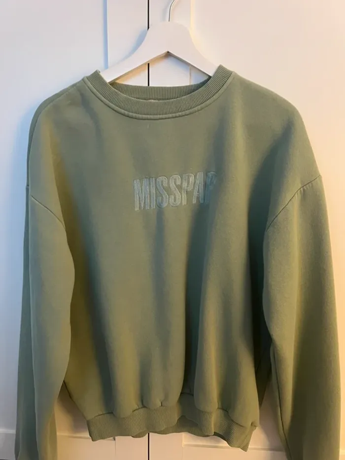 Green sweatshirt
