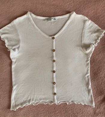 Joli haut blanc bouton bois 10 ans