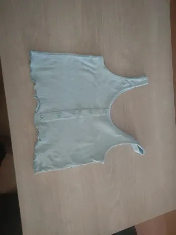 Bleu ciel Kiabi 14 ans faux bouton froufrou en bas