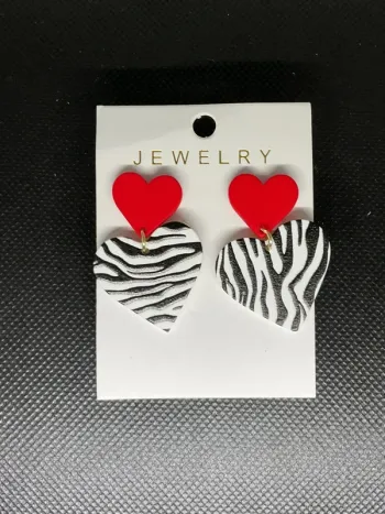 Boucle d’oreille « coeur » neuve
