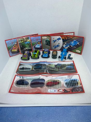 Lot de 7 surprises kinder voiture sprinty et porsche avec leur bpz